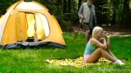 Older man licks blonde teen pussy on grass