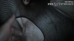 Hand between legs of older woman on sofa