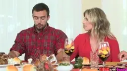 Three people at the festively set Thanksgiving table