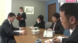 Asian secretary with brown hair in a light blazer kneels in front of two men.