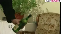 Three older women sit with men on the sofa and use dildos
